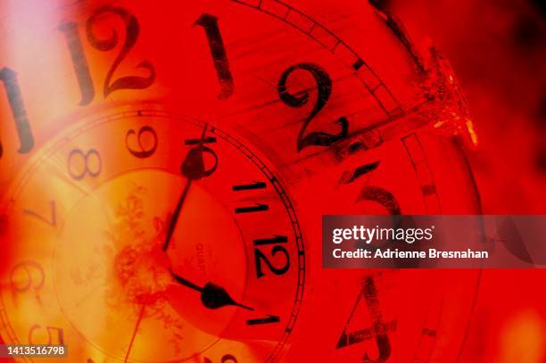antique clock in red - orange alarm clock stock pictures, royalty-free photos & images