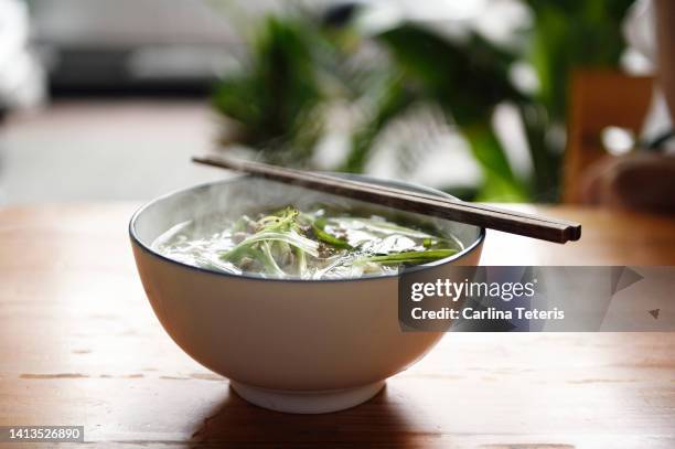 bowl of fresh pho in ho chi minh city - pho stock pictures, royalty-free photos & images