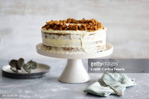 carrot cake on a cake stand - cakestand stock pictures, royalty-free photos & images