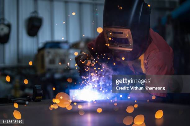 technician welding for steel structure at manufacture workshop. - manufacturing equipment photos et images de collection