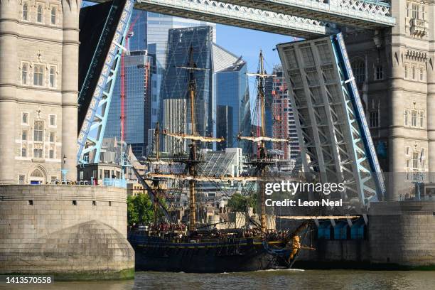 The Götheborg of Sweden sailing ship passes under Tower Bridge on August 08, 2022 in London, England. The vessel, which is a replica of a ship that...