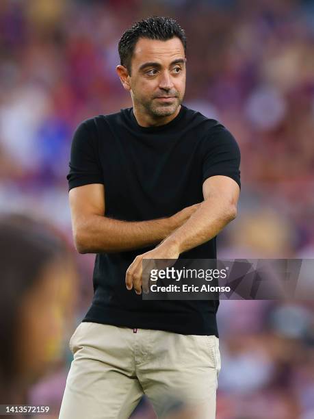 Xavi Hernandez, head coach of FC Barcelona waves the supporters ahead of the Joan Gamper Trophy match between FC Barcelona and Pumas UNAM at Spotify...