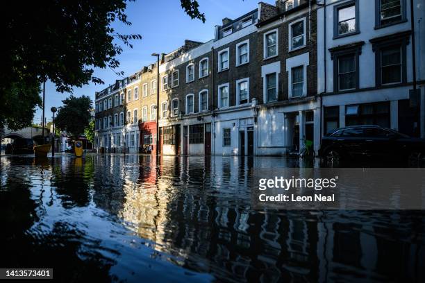 Substantial flooding is seen on roads near to the Arsenal Stadium, following a rupture of water mains, on August 08, 2022 in London, United Kingdom....