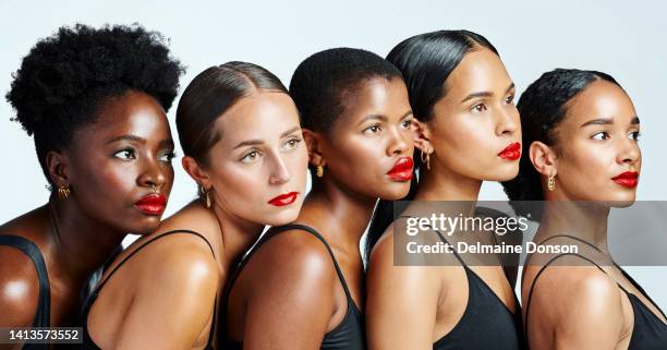 diverse, beautiful and confident women with glowing skin, natural beauty and flawless complexion posing against a studio background. group of serious, international and powerful females - perfect complexion stock pictures, royalty-free photos & images