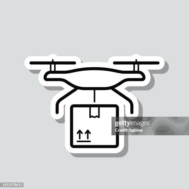 drone delivery. icon sticker on gray background - drone package stock illustrations