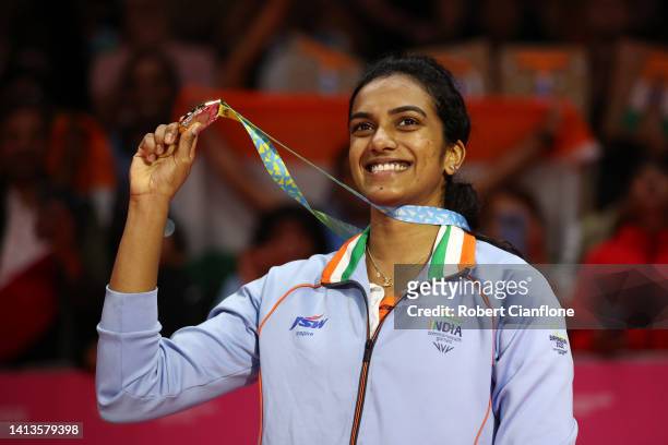 Gold Medalist, Pusarla Venkata Sindhu of Team India celebrates on the podium during the Badminton Women's Singles medal ceremony on day eleven of the...