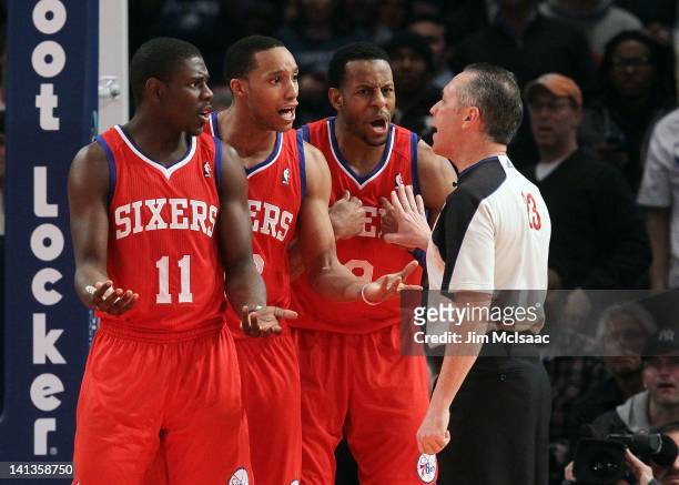 Jrue Holiday, Evan Turner and Andre Iguodala of the Philadelphia 76ers argue a call with the referee against the New York Knicks on Wednesday,...