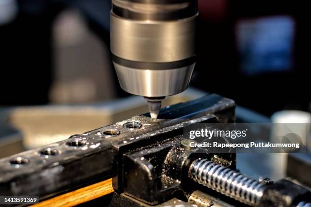 cnc mechanical and technology industry. the process of turning with a cutting and milling tool the outer surface detail of the metalworking parts. - milling stock pictures, royalty-free photos & images