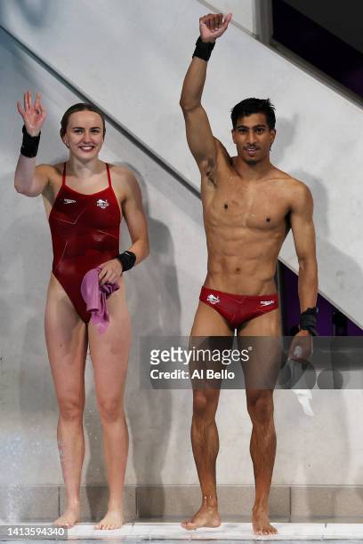 Lois Mae Toulson and Kyle Kothari of Team England celebrate after winning silver in the Mixed Synchronised 10m Platform Final on day eleven of the...