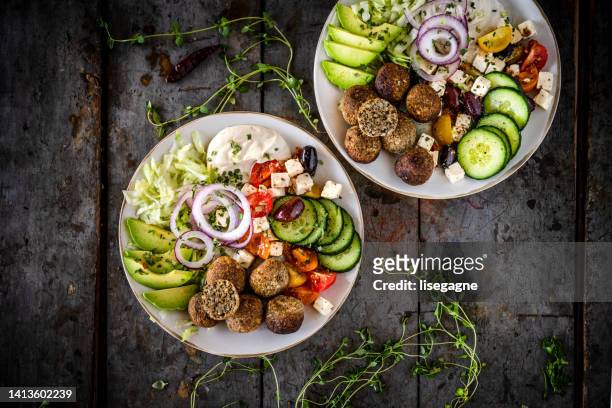 falafels with mediterranean salad - almond meal stock pictures, royalty-free photos & images