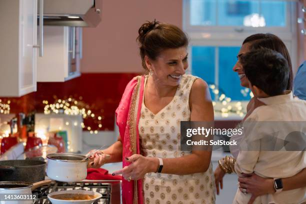 grandmas famous bombay aloo - diwali family stock pictures, royalty-free photos & images