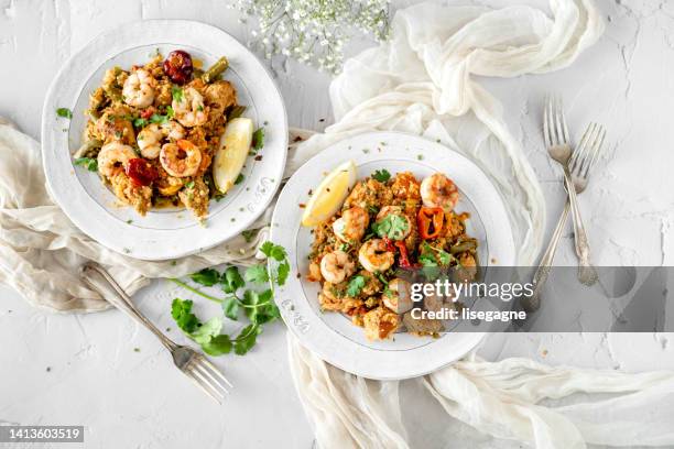 paella - cauliflower rice stock pictures, royalty-free photos & images