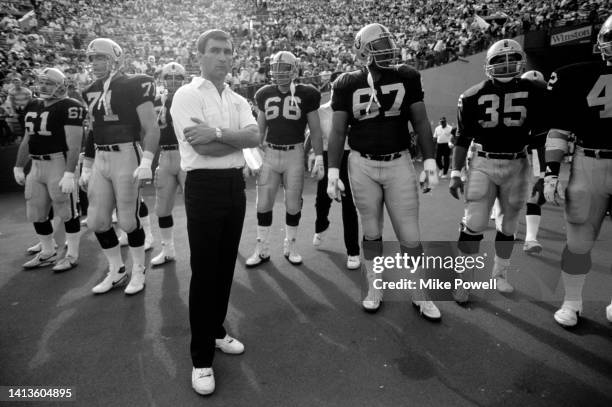 , Mike Shanahan, Head Coach for the Los Angeles Raiders looks on from the side line during the American Football Conference West Division game...