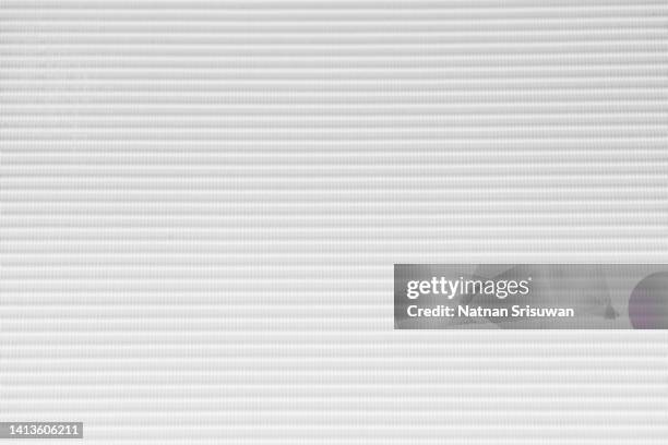 defocused image of white fiberglass mat texture background can use for vertical curtain - ribbed stock pictures, royalty-free photos & images