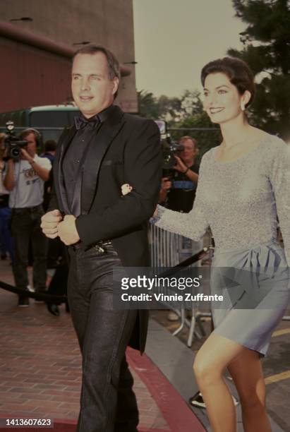 Garth Brooks and American actress Sela Ward attend the 27th Annual Academy of Country Music Awards, held at the Shrine Auditorium in Los Angeles,...