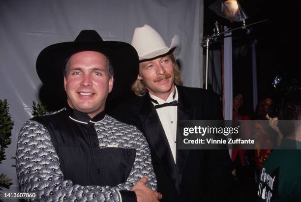 Garth Brooks and Alan Jackson in the press room of the 27th Annual Academy of Country Music Awards, held at Universal Studios in Los Angeles,...