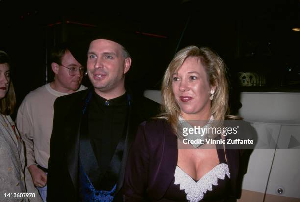 Garth Brooks and his wife, American songwriter Sandy Mahl attend the 23rd Annual American Music Awards, held at the Shrine Auditorium in Los Angeles,...