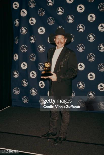 Kix Brooks from Brooks and Dunn music group duo holds Grammy award at the 39th Grammy Award held at Madison Square Garden in New York City, New York,...