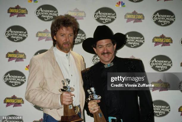 Ronnie Dunn and Kix Brooks hold awards at the 29th Annual Academy of Country Music Awards, held at Universal Amphitheatre in Universal City,...