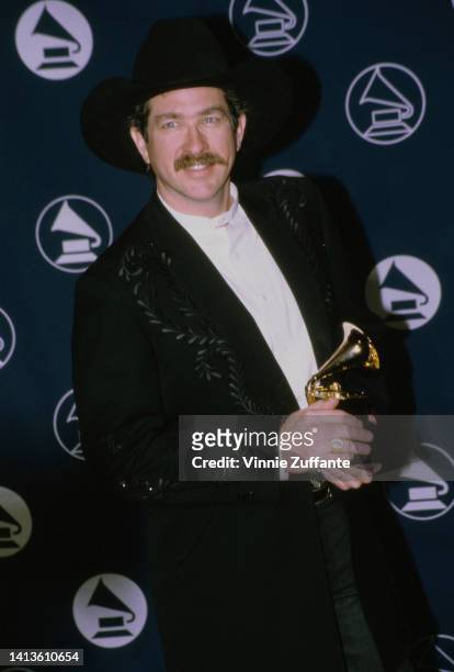 Kix Brooks from Brooks and Dunn music group duo holds Grammy award at the 39th Grammy Award held at Madison Square Garden in New York City, New York,...