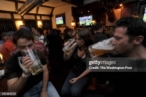 Seth Freedland , Stephanie Gross and Joshua Karlin-Resnick have a beer at The Biergarten Haus in Washington, DC on Friday, July 2, 2010. The...