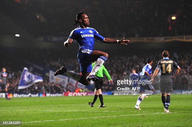 Chelsea's Ivorian forward Didier Drogba celebrates after scoring during the UEFA Champions League round of 16 second leg football match Chelsea vs...