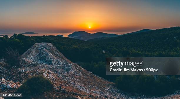 scenic view of mountains against sky during sunset,greece - skyros stockfoto's en -beelden