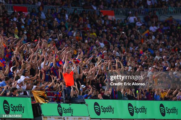 Supporters of Barcelona celebrates during the Joan Gamper Trophy match between FC Barcelona and Pumas UNAM at Spotify Camp Nou on August 07, 2022 in...