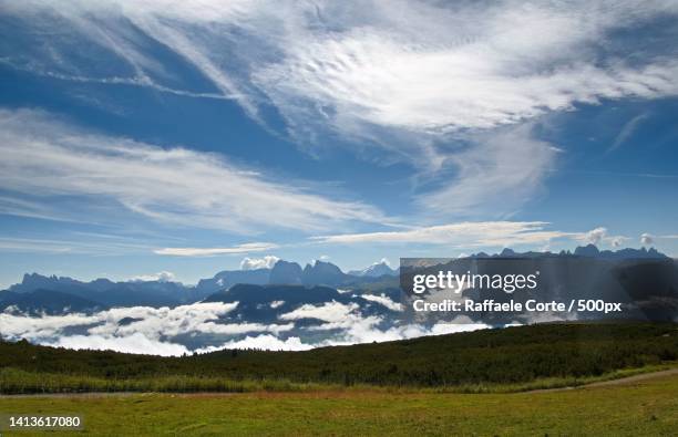 scenic view of snowcapped mountains against sky - raffaele corte stock pictures, royalty-free photos & images