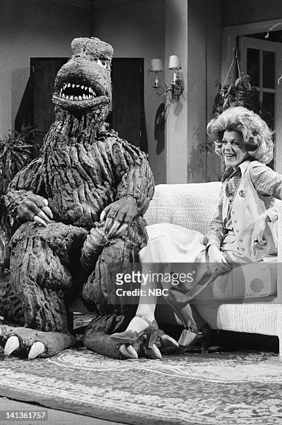 Episode 16 -- Pictured: John Belushi as Godzilla, Gilda Radner as Baba Wawa during the 'Baba Wawa at Large' skit on March 19, 1977.