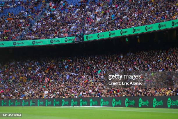 Supporters of Barcelona celebrates during the Joan Gamper Trophy match between FC Barcelona and Pumas UNAM at Spotify Camp Nou on August 07, 2022 in...