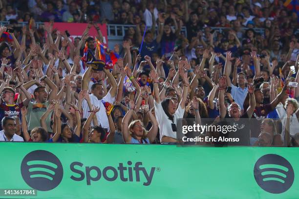 Supporters of Barcelona celebrates during the Joan Gamper Trophy match between FC Barcelona and Pumas UNAM at Spotify Camp Nou on August 07, 2022 in...