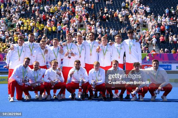 Bronze medalists Team England celebrate during the Men's Hockey - Medal ceremony on day eleven of the Birmingham 2022 Commonwealth Games at...