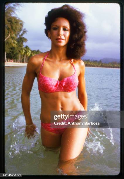 Portrait of American singer and actress Freda Payne, dressed in a bikini, as she stands in the water, Puerto Rico, 1980s.