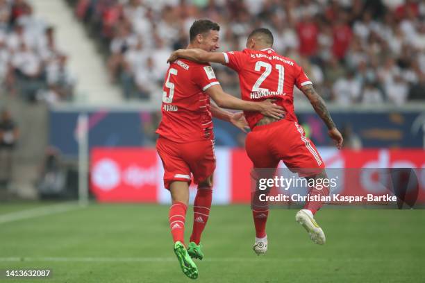 Benjamin Pavard of FC Bayern München celebrates after scoring his team`s second goal with his teammate Lucas Hernandez of FC Bayern München during...