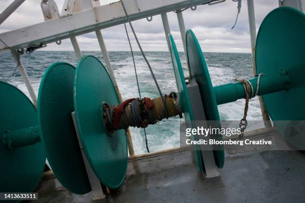 winch gear on a fishing boat - dredger stock pictures, royalty-free photos & images