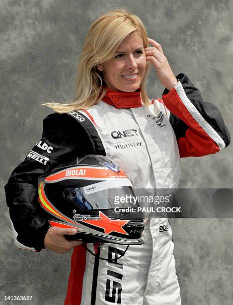 Marussia-Cosworth test-driver Maria de Villota of Spain poses for the official driver's portrait ahead of Formula One's Australian Grand Prix in...