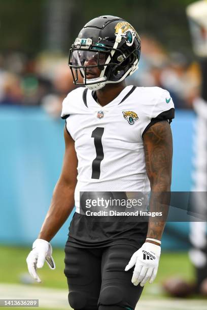 Travis Etienne Jr. #1 of the Jacksonville Jaguars warms up prior to the 2022 Pro Football Hall of Fame Game against the Las Vegas Raiders at Tom...
