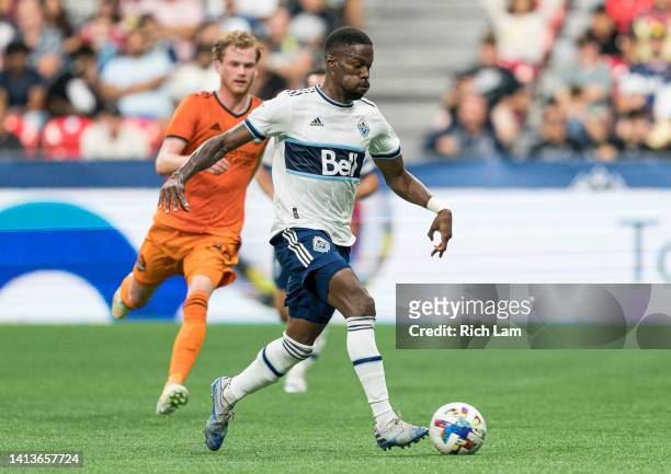 Tosaint Ricketts of the Vancouver Whitecaps FC runs with the ball during a MLS soccer match against Houston Dynamo FC at BC Place on August 05, 2022...