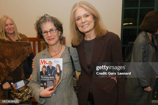 At the Los Angeles Central Library Aloud curator Louise Steinman holding a signed copy of Ms. Magazine poses for a portrait with feminist author...