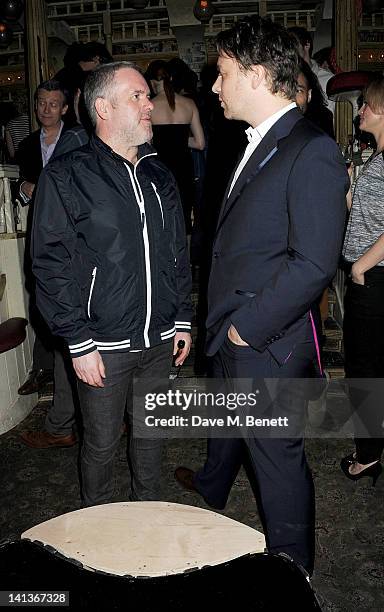 Chris Moyles and Jamie Oliver attend a private screening of Dexter Fletcher's directorial debut 'Wild Bill' hosted by chef Jamie Oliver at The Box...