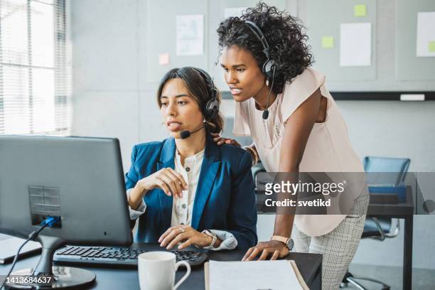 call center - communication occupation stock pictures, royalty-free photos & images