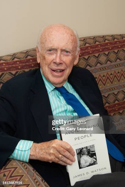 During the Aloud series at the Los Angeles Central Library geneticist James D. Watson poses for a portrait with his book Avoiding Boring People on...