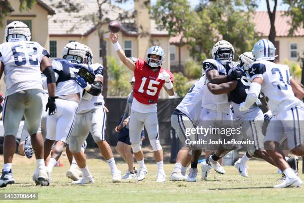 Quarterback Will Gier of the Dallas Cowboys throws a pass during training camp at River Ridge Fields on August 08, 2022 in Oxnard, California.