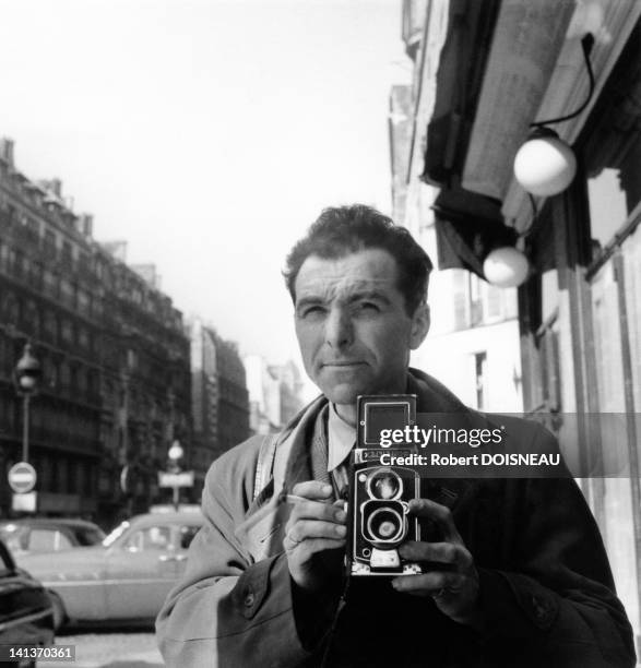 Robert Doisneau's self-portrait with his Rolleiflex in March 1953 in France.