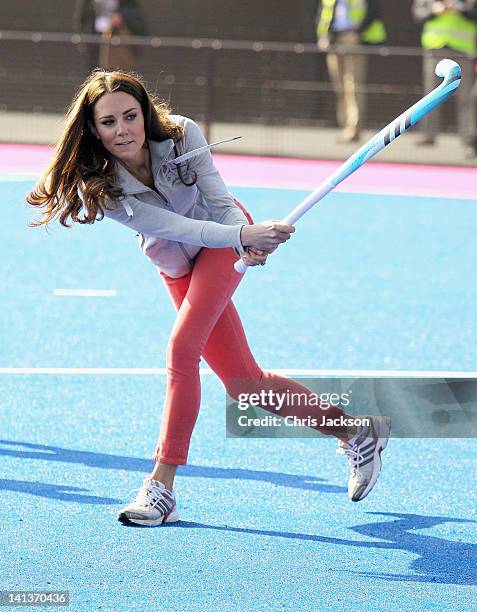 Catherine, Duchess of Cambridge plays hockey with the GB hockey teams at the Riverside Arena in the Olympic Park on March 15, 2012 in London,...