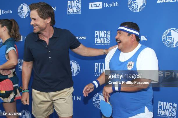 Rob Lowe and Guillermo Rodriguez attend Ping Pong 4 Purpose at Dodger Stadium presented by Skechers and UCLA Health at Dodger Stadium on August 08,...