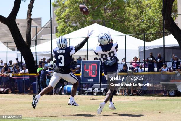 Wide receiver CeeDee Lamb of the Dallas Cowboys catches the ball during training camp at River Ridge Fields on August 08, 2022 in Oxnard, California.