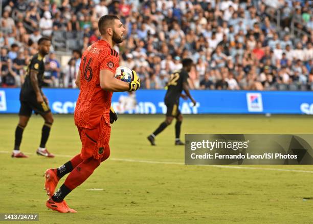 Maxime Crepeau of Los Angeles Football Club prepares to distribute the ball during a game between Los Angeles FC and Sporting Kansas City at...