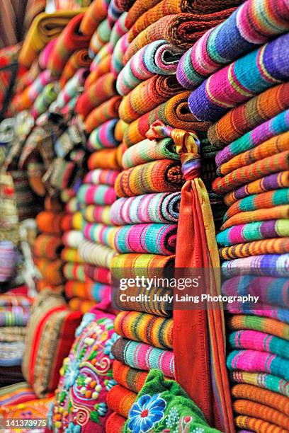 colourful textiles at peruvian market - lima peru stock pictures, royalty-free photos & images